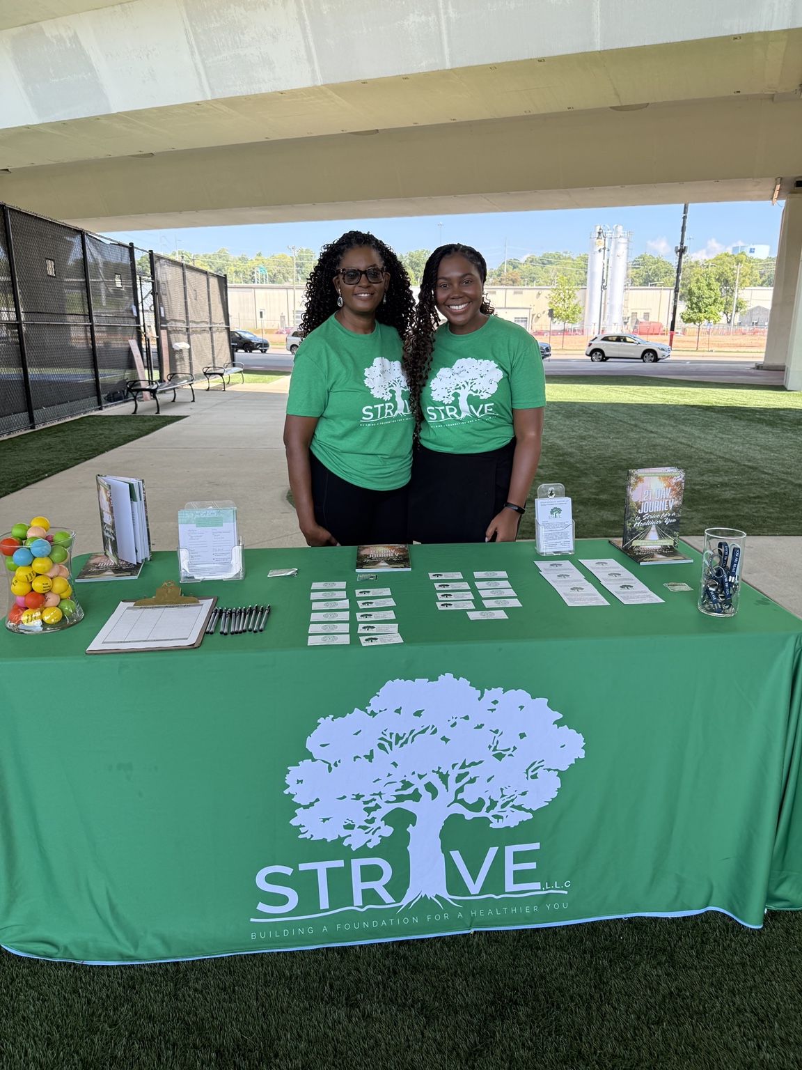 STRIVE LLC wellness table at the City Walk event